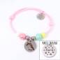 Pulsera elástica rosa con unicornio personalizada (acero)